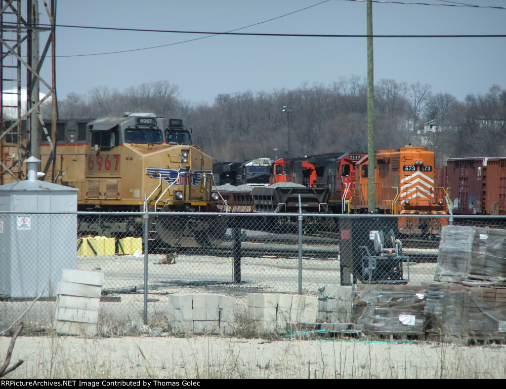 A bunch of engines in the yard.